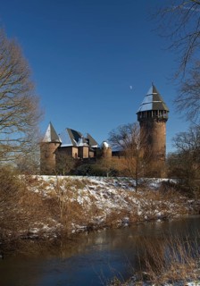 Linn Castle moated castle in Krefeld-Linn in winter, Krefeld, Lower Rhine, North Rhine-Westphalia,
