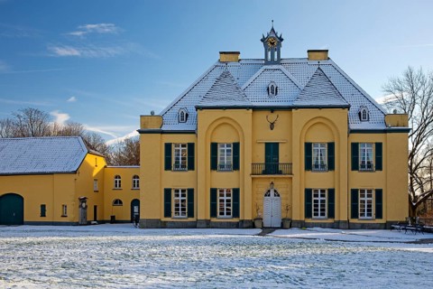 The hunting lodge at Linn Castle in winter, Krefeld, Lower Rhine, North Rhine-Westphalia, Germany,