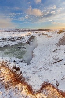 Gullfoss waterfall in the snow in winter located in the canyon of Hvítá river, Haukadalur,