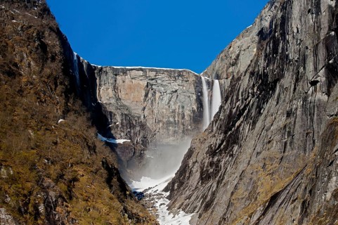 The magnificent Vedalsfoss, a steep waterfall in Hjolma Valley in Eidfjord, Hordaland, Norway.