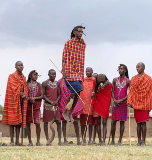 Maasai people preforming the traditional jumping dance in a Maasai village in Maasai Mara, Kenya,