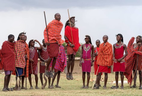 Maasai people preforming the traditional jumping dance in a Maasai village in Maasai Mara, Kenya,
