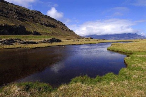 Pool or pond near the lighthouse at Streitishvarf, in the East Fjords region of eastern Iceland