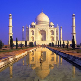 Classic early-morning view of the Taj Mahal reflecting in still water, Agra, India, Asia