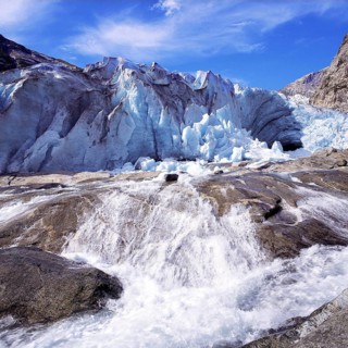 A vigourous melt-water stream issuing from the snout of the Nigardsbreen glacier, Jostedal National