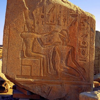 Carved granite block with pharoah and queen at Luxor, Egypt, Africa