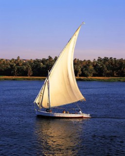 The traditional Nile sailing-boat, the felucca, sailing on the Nile near Luxor, Egypt, Africa