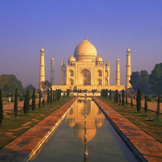 Classic early-morning view of the Taj Mahal reflecting in still water, Agra, India, Asia