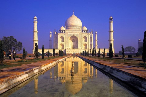 Classic early-morning view of the Taj Mahal reflecting in still water, Agra, India, Asia