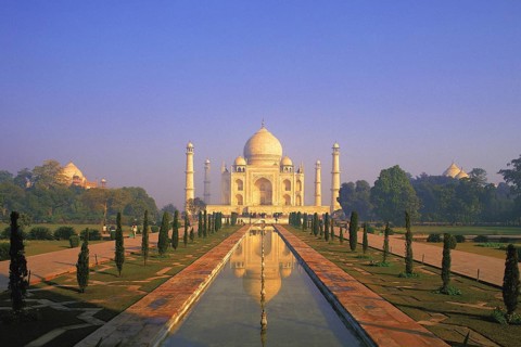 Classic early-morning view of the Taj Mahal reflecting in still water, Agra, India, Asia