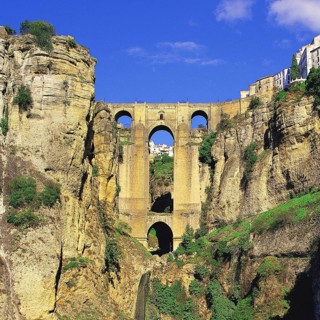 The famous gorge and bridge of the divided town of Ronda, in the Serrania de Ronda, southern Spain