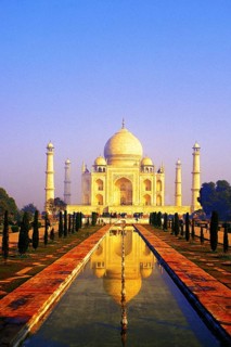 Classic early-morning view of the Taj Mahal reflecting in still water, Agra, India, Asia