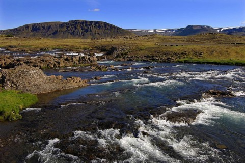 Rapids on the Laxa river, Hvalfjordur, west Iceland, with the Medalfell hills behind