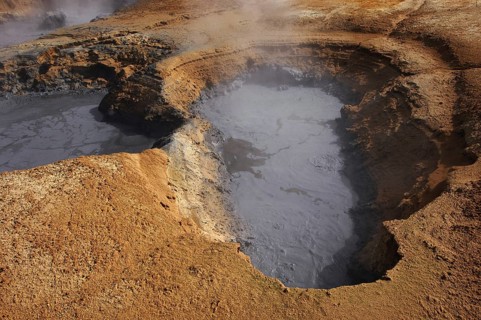 Boiling mud-pool in a geothermal landscape at Hverarond near Myvatn, north Iceland