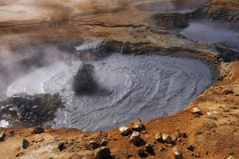 Boiling mud-pool in a geothermal landscape at Hverarond near Myvatn, north Iceland