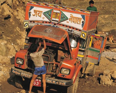 Brightly-painted broken-down truck at the village of Melemchi in the Helambu region of central
