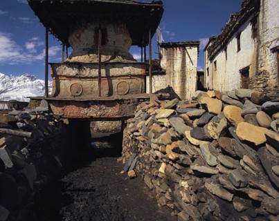 HUge chorten at the entrance to the hilltop Tibetan-style fortress village of Jharkot in the