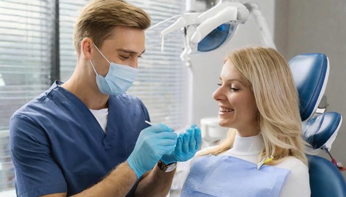 AI generated, A dentist treats a young woman, Blonde, 30, 35, years, Dental treatment, Follow-up