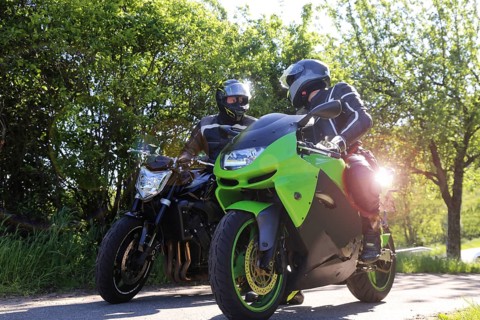 Two motorcyclists on a short stopover