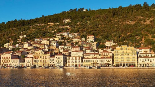 Dense development along the coast, glowing in the light of the morning sun, Gythio, Mani,