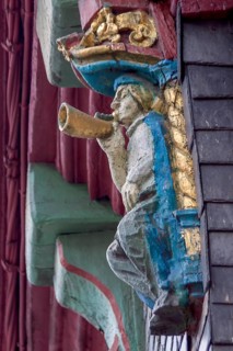 Carved wooden figure on a historic half-timbered house, Morlaix, Departements Finistere, Brittany,