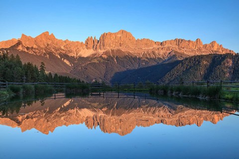 Mountains reflected in a small mountain lake, sunset, evening light, Wuhnleger, view of rose