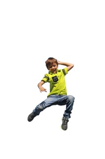 Symbolic image: Boy jumping into the air (white background)