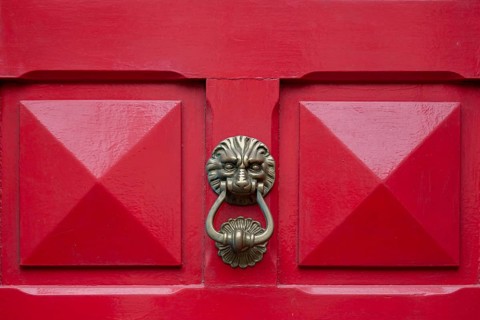 Door knocker on a red front door, Roscoff, Finistere, Brittany, France, Europe