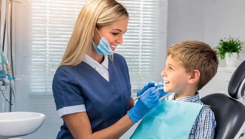AI generated, dentist treats little boy, dentist, blonde, 30, 35, years, dental treatment,