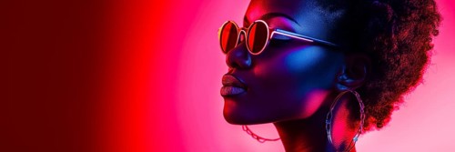Profile of an elegant woman, illuminated with neon pink, creates strong shading, trendy glasses and