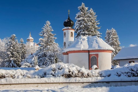 Winter atmosphere with snow-covered small chapel at Schlehdorf Monastery, Schlehdorf, Lake Kochel,