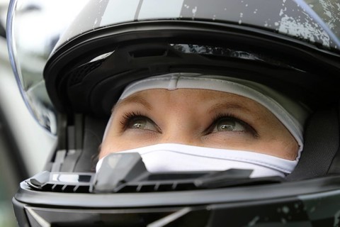 Racer with helmet and balaclava