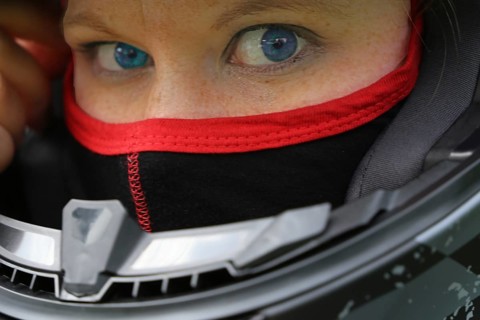 Racer with helmet and balaclava