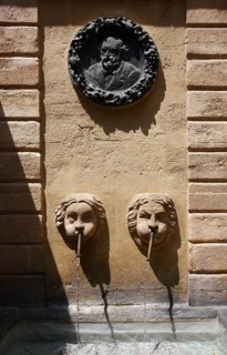 Fontaine des Bagnier, the Medallion, a portrait by Paul Cezanne, after a drawing by Auguste Renoir,