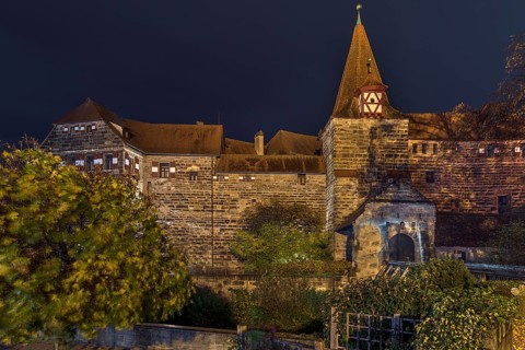 Wenzelburg or Laufer Kaiserburg, illuminated at night, rebuilt by Emperor Charles IV in 1556,