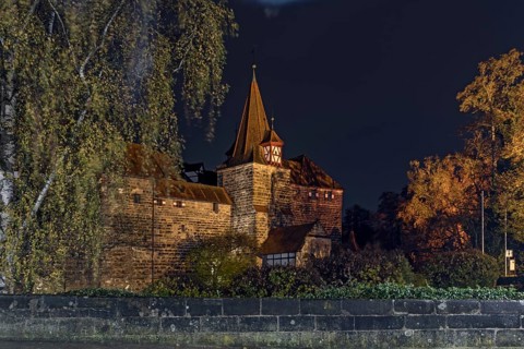 Wenzelburg or Laufer Kaiserburg castle illuminated at night, rebuilt by Emperor Charles IV in 1556,