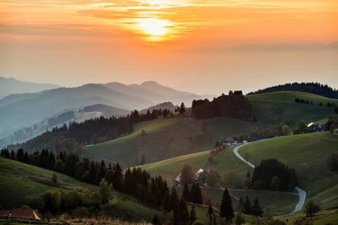 Hilly landscape, sunset, view from Schauinsland into Muenstertal, near Freiburg im Breisgau, Black