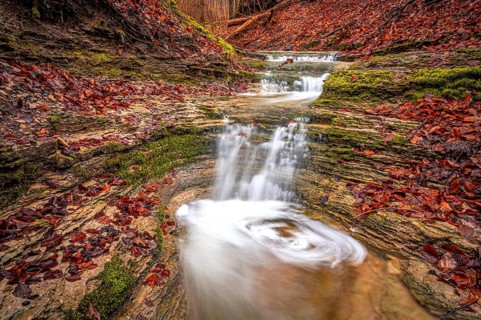 Waterfall in the Rautal forest in Jena in winter, Jena, Thuringia, Germany, Europe