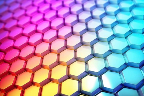 Gradient honeycomb pattern illuminated with vibrant colors. Ideal for backgrounds, wallpapers, and