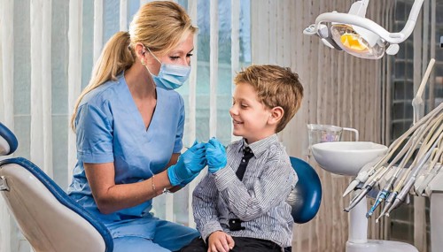 AI generated, dentist treats little boy, dentist, blonde, 30, 35, years, dental treatment,