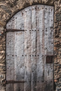 Door detail in Rupit, one of the best known medieval towns in Catalonia in Spain