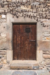 Detail of a door in a medieval house in Rupit in Catalonia Spain