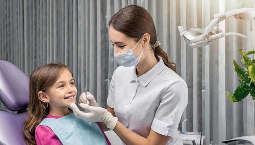 AI generated, dentist treats a little girl, dentist, blonde, 30, 35, years, dental treatment,