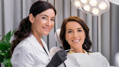 AI generated, dentist treats a middle-aged woman, dentist, blonde, 30, 35, years, dental treatment,