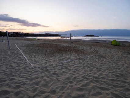 Morning atmosphere on the beach at sunrise, beach volleyball court, Lopar, island of Rab, Kvarner