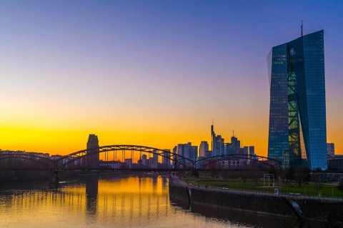 Evening atmosphere at the European Central Bank (ECB) with skyline behind the Deutschherrnbruecke