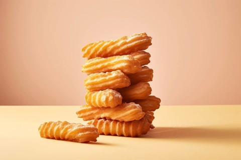 Stack of SPanish fried churros. KI generiert, generiert AI generated