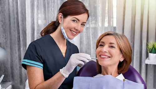 AI generated, dentist treats a middle-aged woman, dentist, blonde, 30, 35, years, dental treatment,