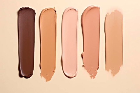 Makup foundation swatches with different light and dark colored skin tones. KI generiert, generiert