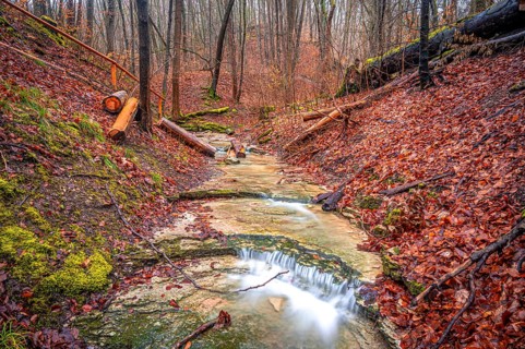 Waterfall in the Rautal forest in Jena in winter, Jena, Thuringia, Germany, Europe
